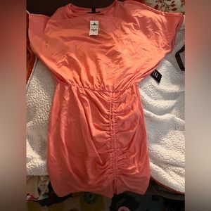 Brand new with tags coral color cotton dress from Express.